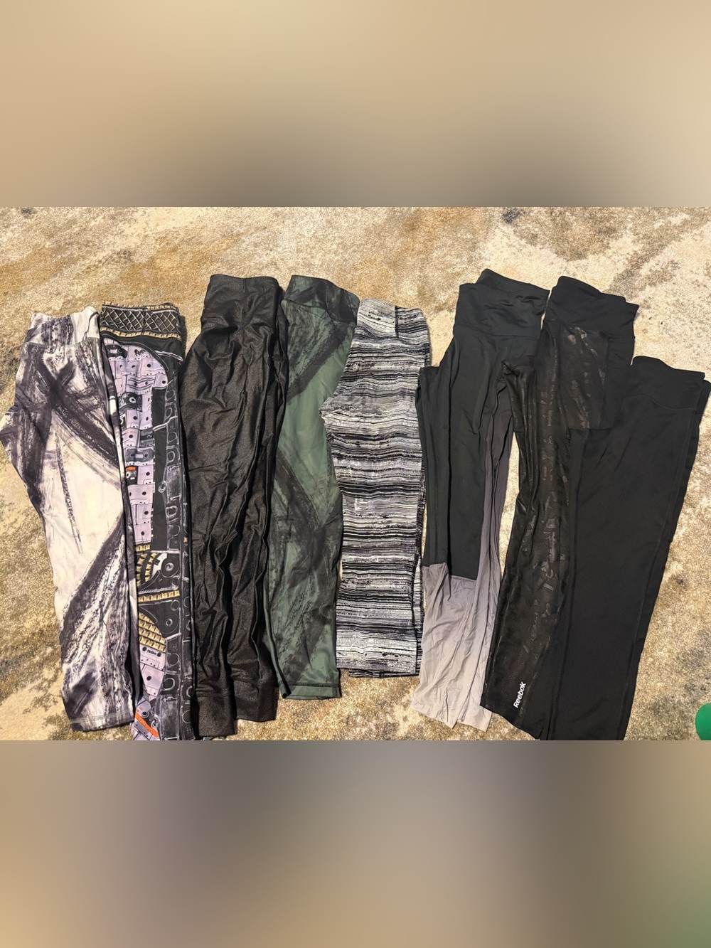 8 pairs of reebok leggings size medium